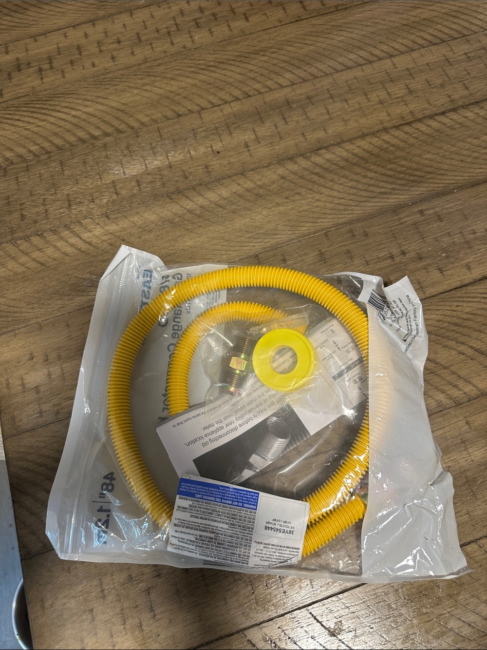 Yellow Corrugated Gas Connector with Thread Seal Tape